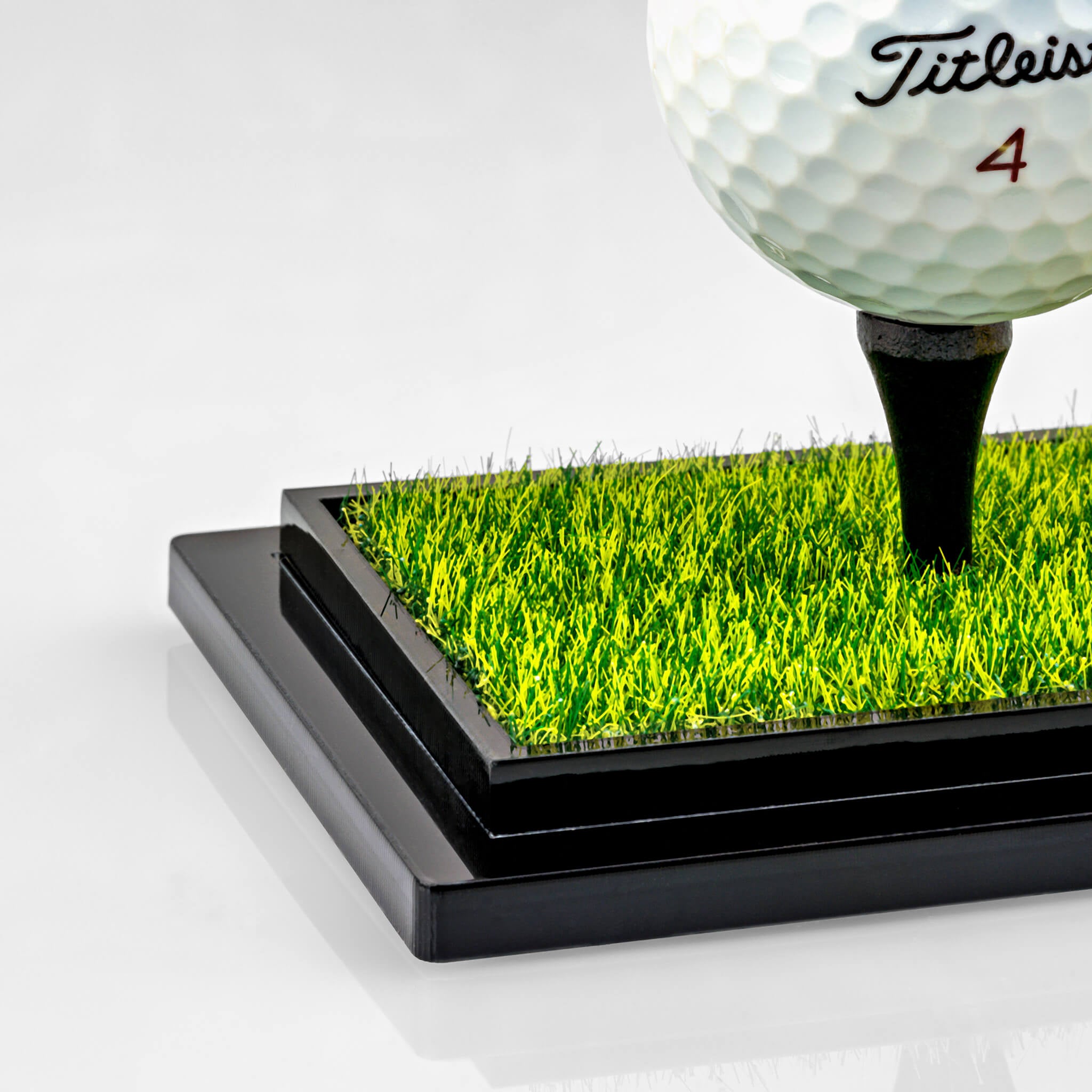 Turf base for custom background golf ball display case by Display Champ
