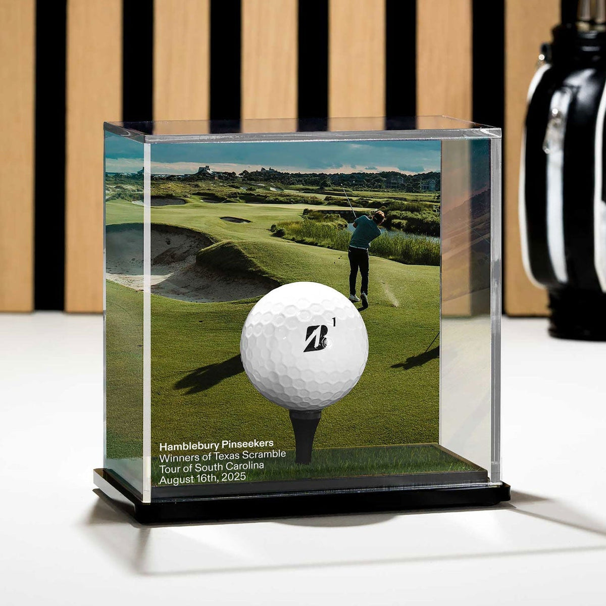 Personalised golf ball display case at home