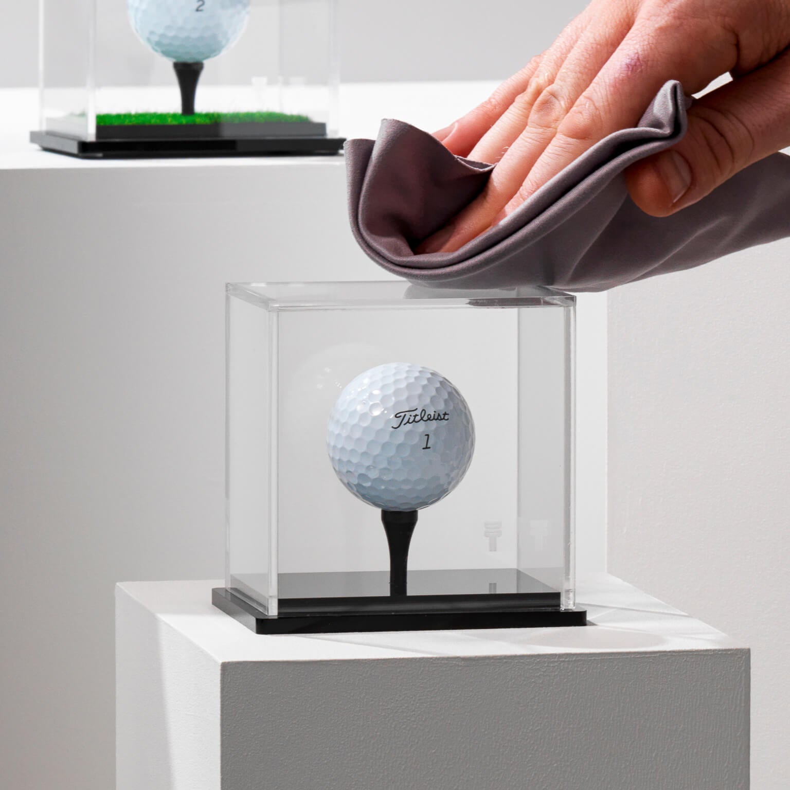 The Icon-UV Hole In One Background Golf Ball Display Case