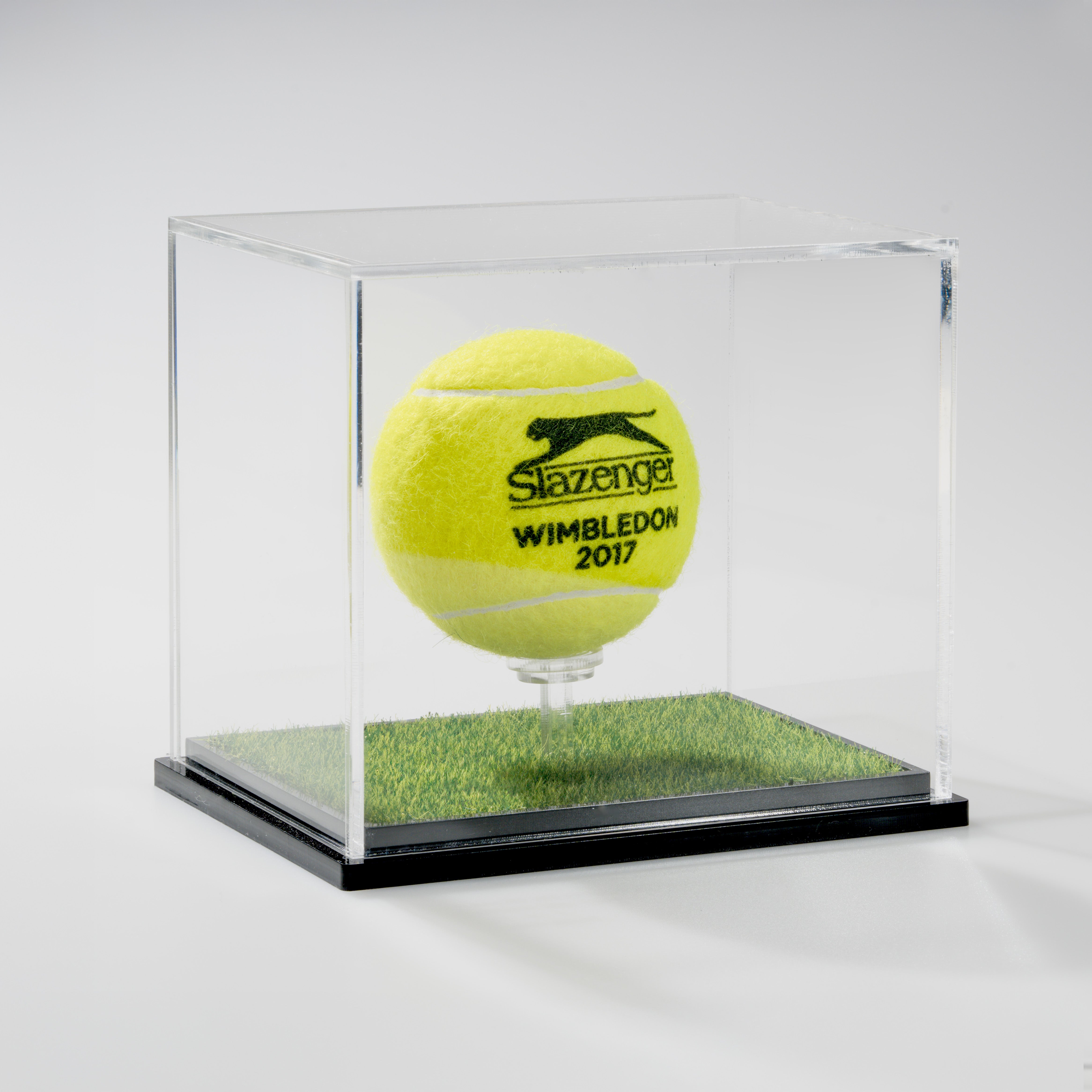 Slazenger Wimbledon 2017 tennis ball in a clear display case, featuring white laser engraving.
