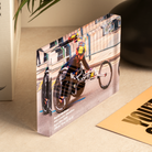 a picture of a man on a bicycle