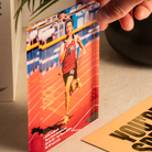 a person holding a picture of a runner